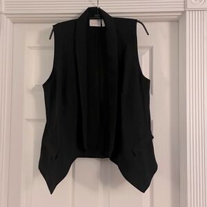 Chicos Sz 1=8-10 M black dressy vest. Fun pleat lapel, with pockets if wanted.